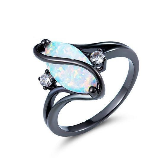 S-shaped  blue black gold horse eye ring